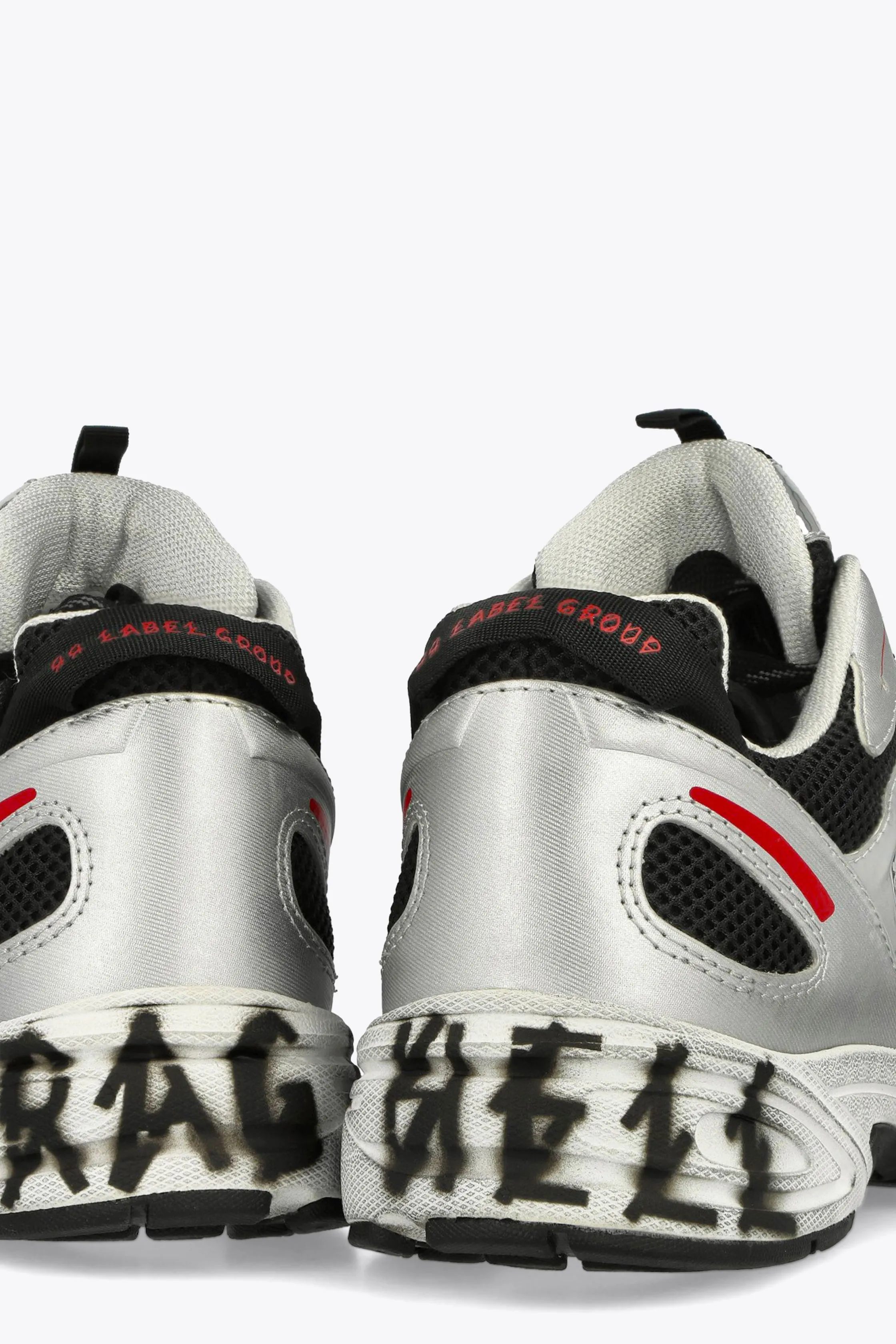 Sneaker bassa in mesh nera e pelle argento