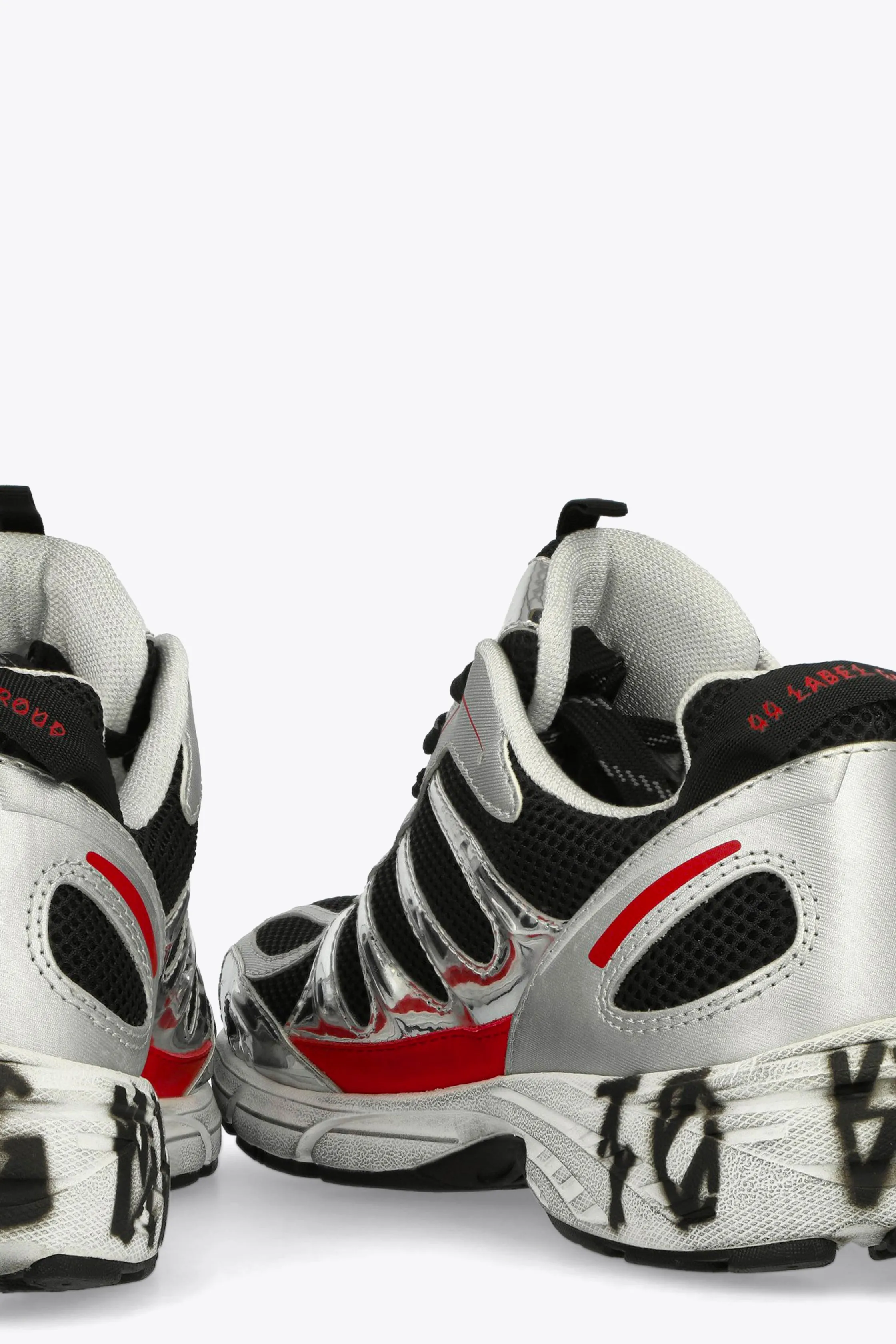 Sneaker bassa in mesh nera e pelle argento